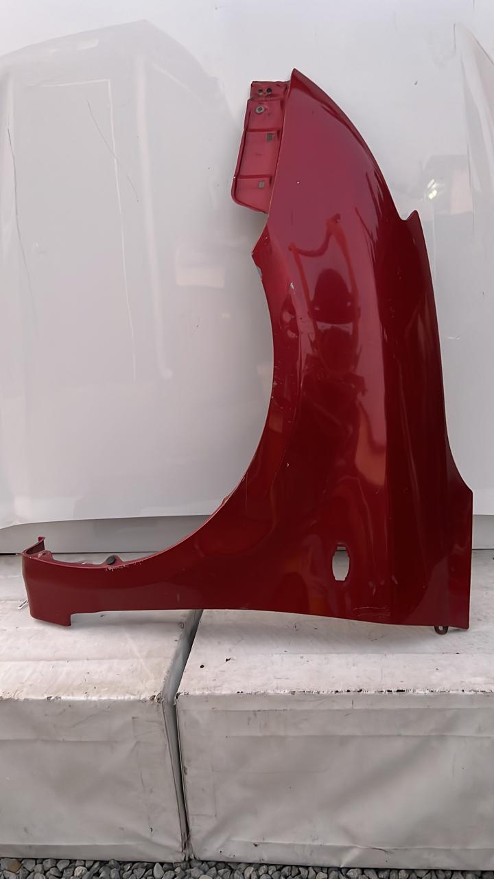 TAPABARRO IZQUIERDO SUZUKI SWIFT (05-10)